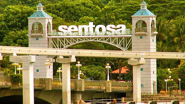 Bus Charter to Sentosa Singapore - Group Visit Guide & Rates 2026 4 sentosa singapore waterfront with iconic entrance and lush greenery.